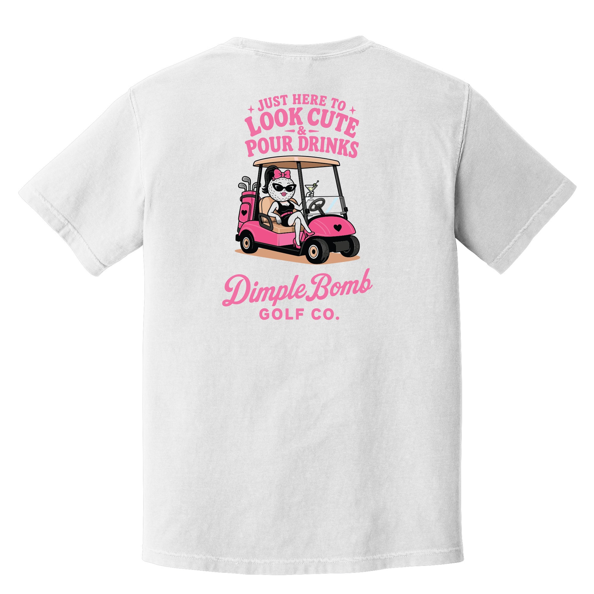 A white short-sleeve t-shirt shown from the back, featuring a pink graphic of a cartoon dog in a pink golf cart with the text 'Just Here to Look Cute Pour Drinks' and 'DimpleBomb Golf Co.'.