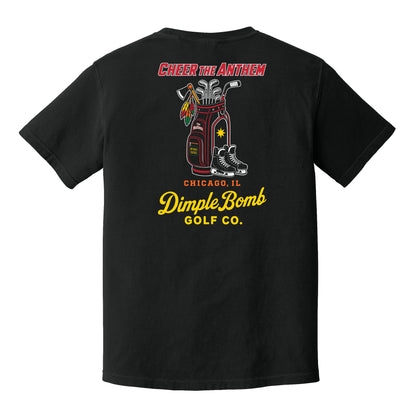Cheer the Anthem black golf tee featuring a Chicago-inspired golf bag with golf clubs, hockey stick, tomahawk and ice skates.