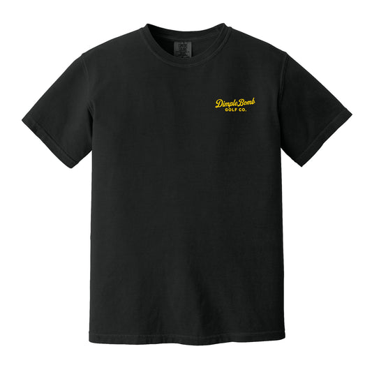 A black short-sleeve crewneck t-shirt with yellow logo text on the left chest reading 'Dimple Bomb Golf Co.' on a plain white background.