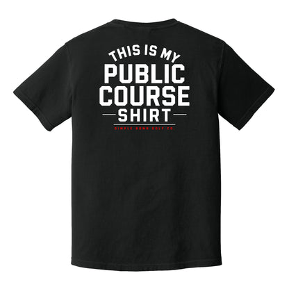 Black Public Course Tee featuring a white “This Is My Public Course Shirt” back graphic with red Dimple Bomb Golf Co. branding.